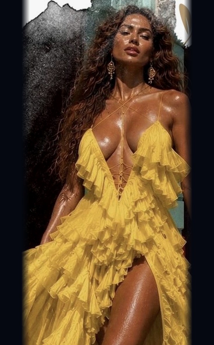 Model in a flowing golden gown